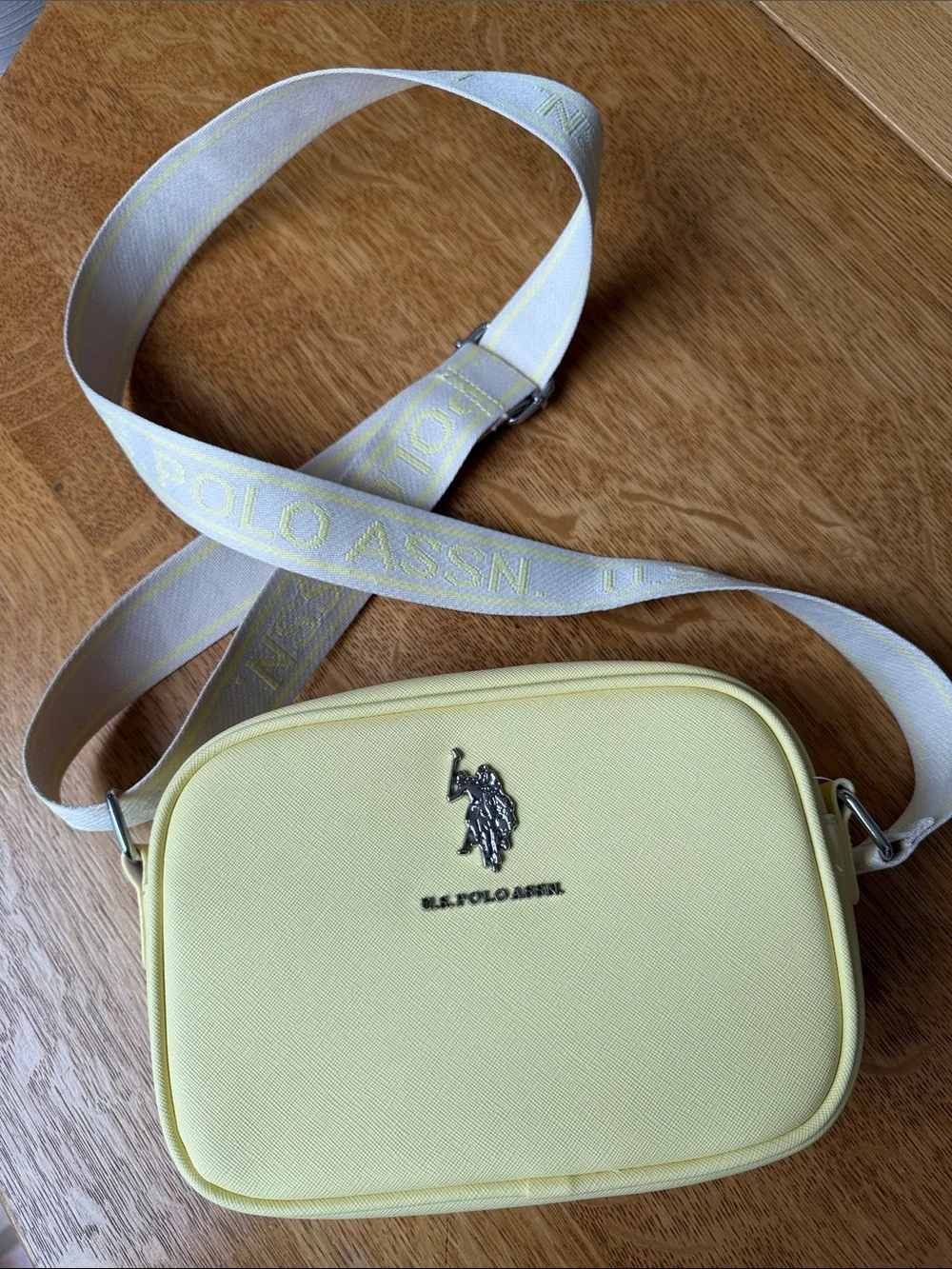 U.S. Polo Assn. Pale Yellow Crossbody Camera Bag with Branded Strap